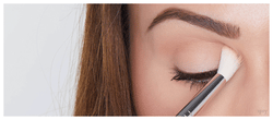 Woman applying Eye Will Stay - Naturally Long Wearing Eyeshadow